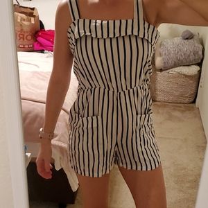 Romper Size small brand new . White and black